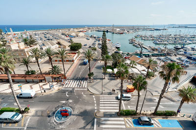 High angle view of harbor by sea against sky