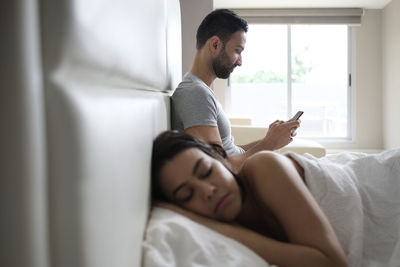 Young man using mobile phone