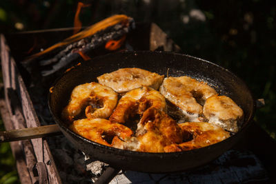 Close-up of meat on barbecue grill