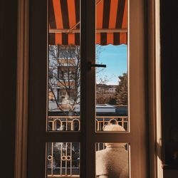 Reflection of building on glass window
