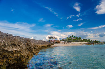 Scenic view of sea against blue sky