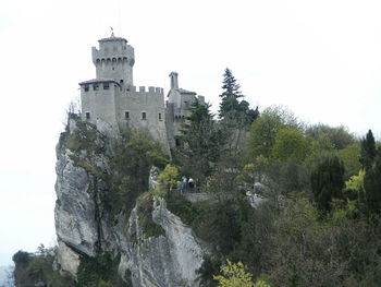 View of built structures against clear sky