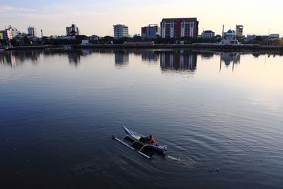 High angle view of people in river