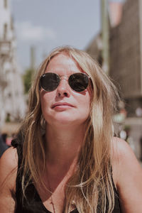 Portrait of beautiful woman wearing sunglasses