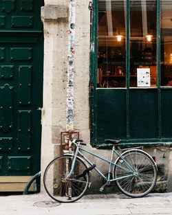 Bicycle parked outside building