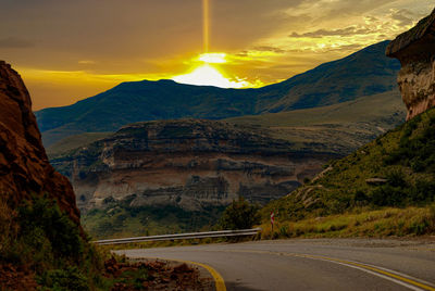 Scenic view of mountains against sky during sunset