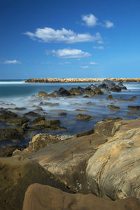 Scenic view of beach against sky