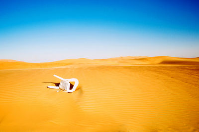 View of desert against clear sky