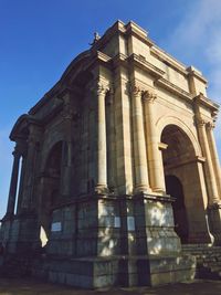 Low angle view of historical building against sky