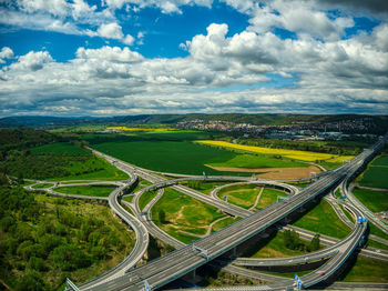 High angle view of highway against sky in city