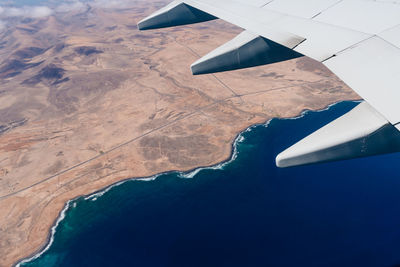 Airplane flying over land