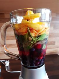 Close-up of cocktail in glass on table