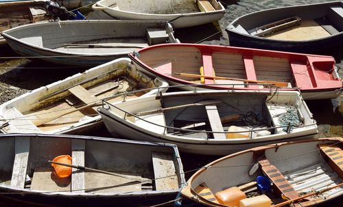 High angle view of abandoned boats moored at harbor