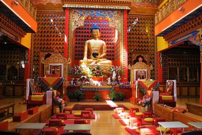 Statue in temple outside building