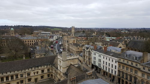 High angle view of buildings in city against sky