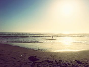 Scenic view of beach during sunset