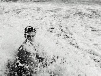 Man swimming in sea