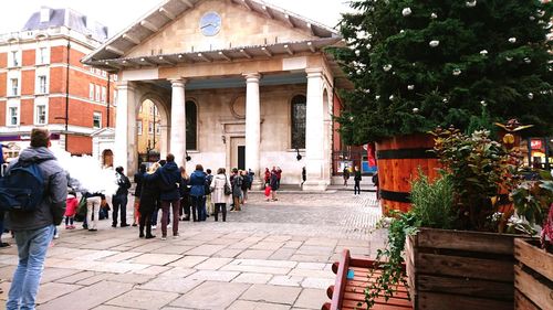 People in front of building