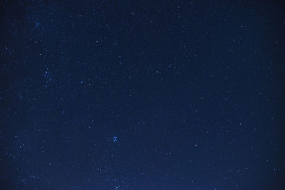 Low angle view of stars against sky at night