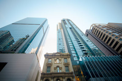 Low angle view of building in city against sky