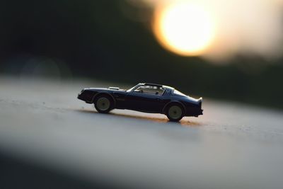 Close-up of toy car on street