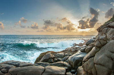 Scenic view of sea against sky during sunset