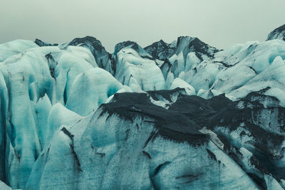 Ice mountain with black sand landscape photo