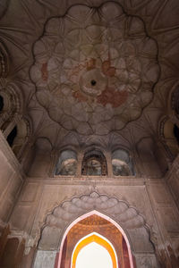 Low angle view of ceiling of historic building