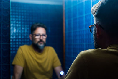 Portrait of man and woman in bathroom