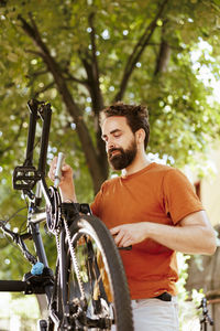Portrait of man riding bicycle