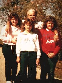 Full length portrait of happy friends standing outdoors