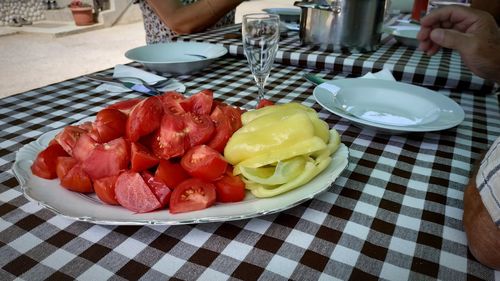 High angle view of strawberries in plate on table