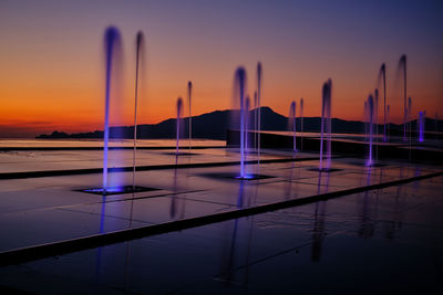 Scenic view of sea against sky at sunset