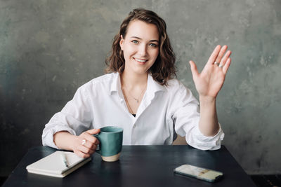 Young woman using mobile phone