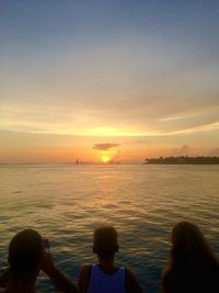 Scenic view of sea at sunset