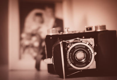 Close-up of camera on mirror at home