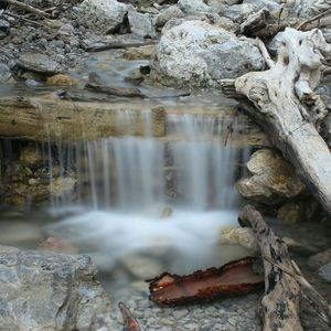 Close-up of water flowing through rocks