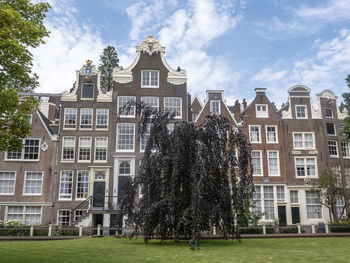 View of residential buildings against sky