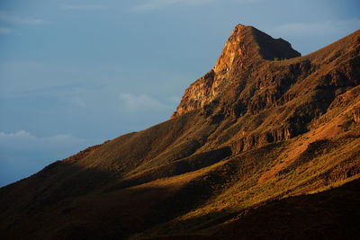 Low angle view of mountains against sky at canary islands