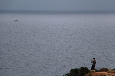 Man standing in sea