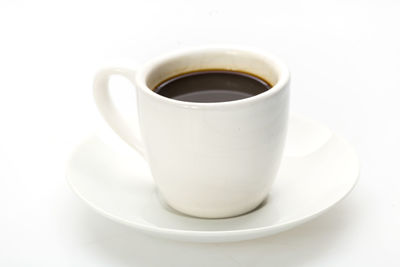 Close-up of coffee cup on table