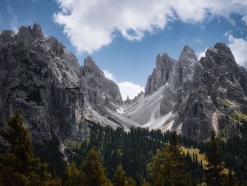 A valley in the middle of a rocky mountain in the dolomites, italy