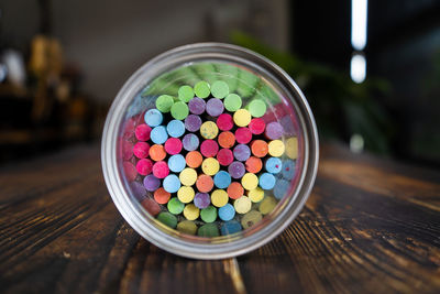 Directly above shot of multi colored candies on table