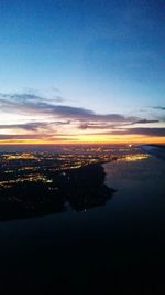 Aerial view of cityscape against sky