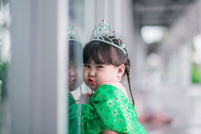 Portrait of cute girl wearing crown