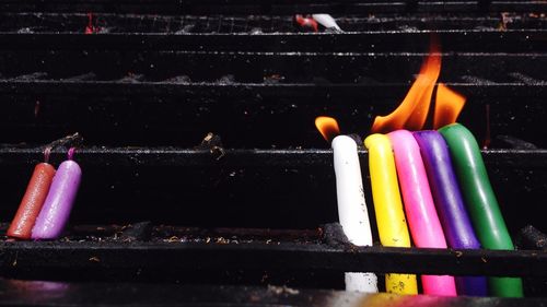 Multi colored pencils at night