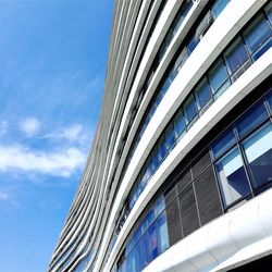 Low angle view of building against blue sky