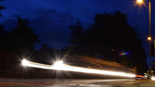 Illuminated street light at night