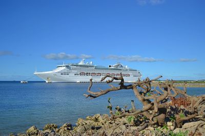 Scenic view of sea against clear blue sky