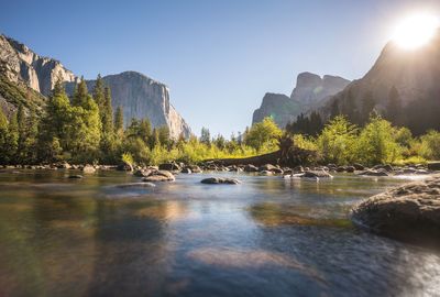 Scenic view of river against sky at yosemite national park on sunny day